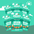 Paleo Foods Co. Super Nutty Brain Boost Granola packaging on a green background with sun and clouds.
